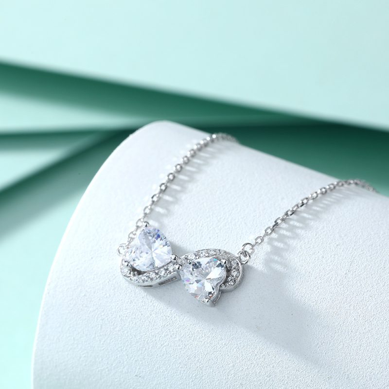 2022 new fashion European and American style necklace female simple bow double heart zircon necklace S925 sterling silver necklace